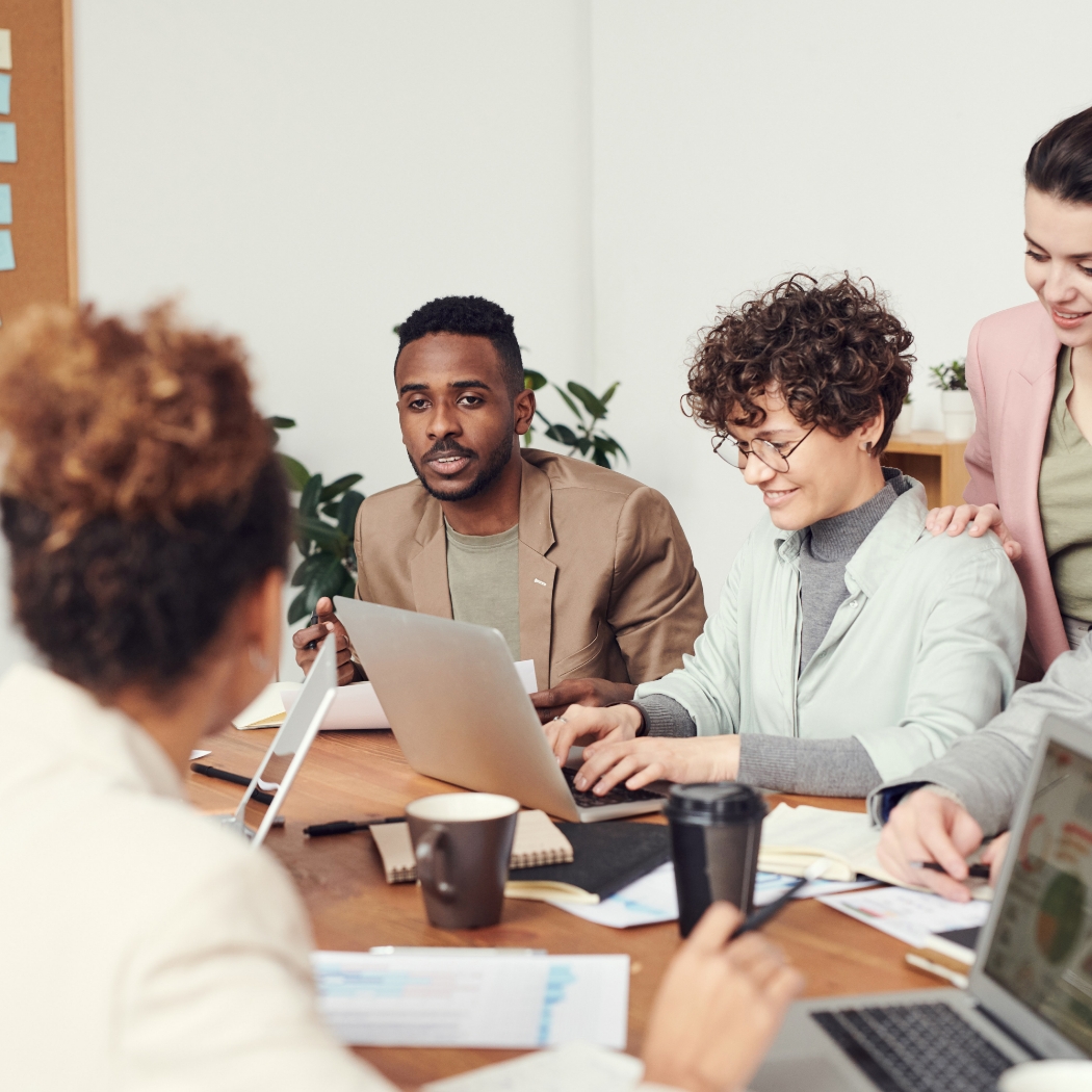 Business team working together using computers and reliable internet connectivity