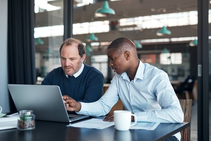 Austin business team evaluating Kinetic Business fiber options